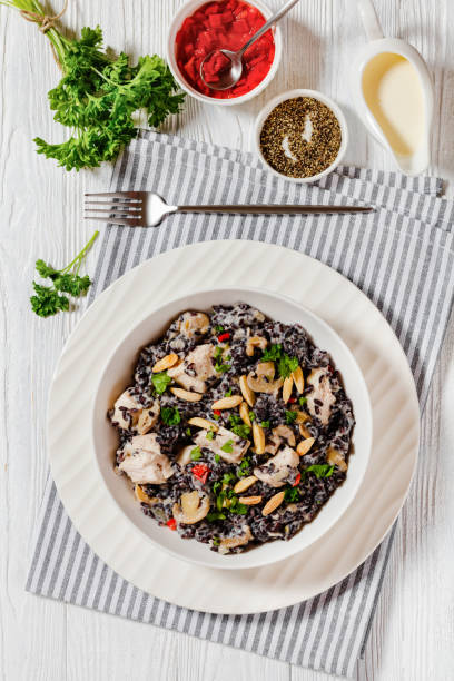 istock black rice with cream, chicken, mushrooms, almonds 1493119800