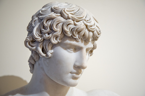 Ancient Roman or Greek goddess marble statue in People's Square in Rome, made in the 19th century (with copy space)