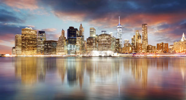 istock New York city skyline at sunrise with reflection. 1493120144