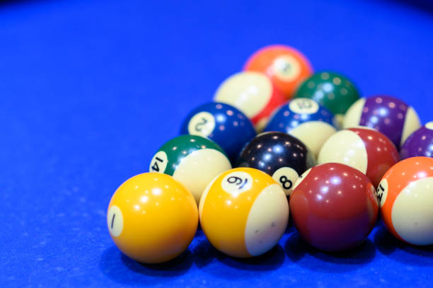 istock Billard pool game. Billiard balls on blue pool table, Pool game. 1493120475
