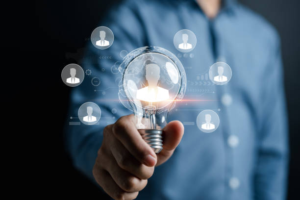 istock CRM or Customer relationship management with lightbulb. Businessman use digital data for exchange and connecting network, Teamwork partnership on global network, Digital business marketing. 1493123235