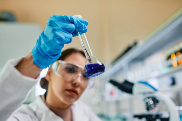 istock Close up of female scientist analyzing chemical substance while working in a lab. 1493125148