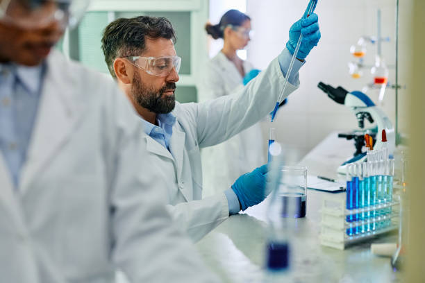 istock Male biotechnologist analyzing chemical samples during scientific research in lab. 1493125175