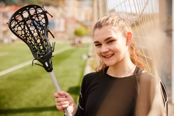 istock Cheerful Athlete: Portrait of a Smiling Lacrosse Player 1493125220