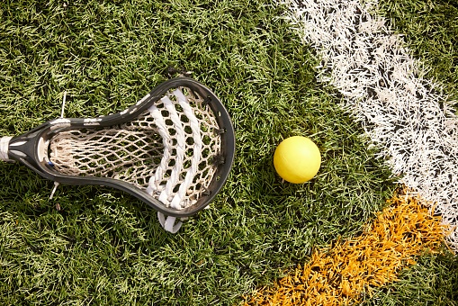 View of Lacrosse Scoop and Ball on the Field.