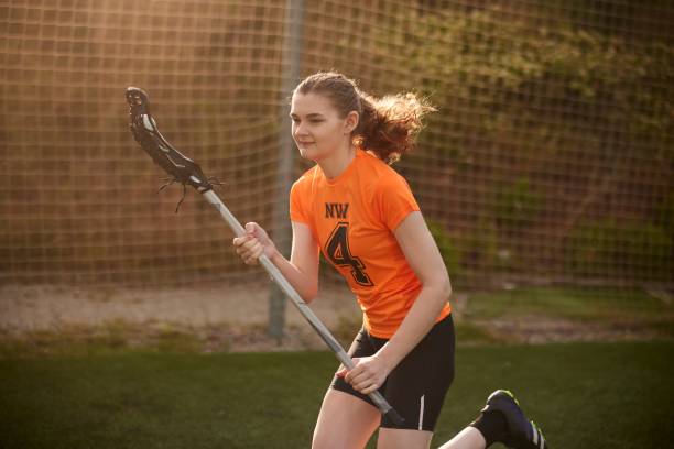 istock Energetic Lacrosse Player Embodies Agility and Intensity in Sideline Dash 1493125954