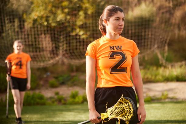 istock Poised and Assertive: Lacrosse Player Exhibits Confidence during Game Pause 1493125987