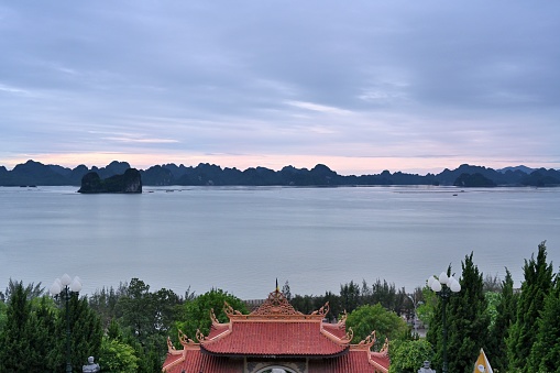 Ha Long Bay is located in Ha Long City, Quang Ning Province, Vietnam. It is a typical limestone karst landform bay. The whole bay has about 120 kilometers of coastline, a total area of about 1553 square kilometers, and about 2000 islets.\nAbout 434 square kilometers of the central area (containing 775 islets) is a World Natural Heritage Site. The scenery is beautiful and charming.\nIt is a national scenic spot in Vietnam. Countless foreign tourists come here for sightseeing.\nThe sunrise is very spectacular here！