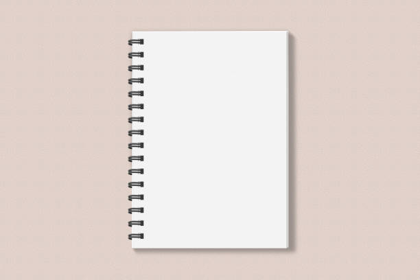 Realistic spiral notebook blank cover mockup flatlay. Simple blank note book mock up on clean background top view. White empty notepad cover to place your design, flat lay concept