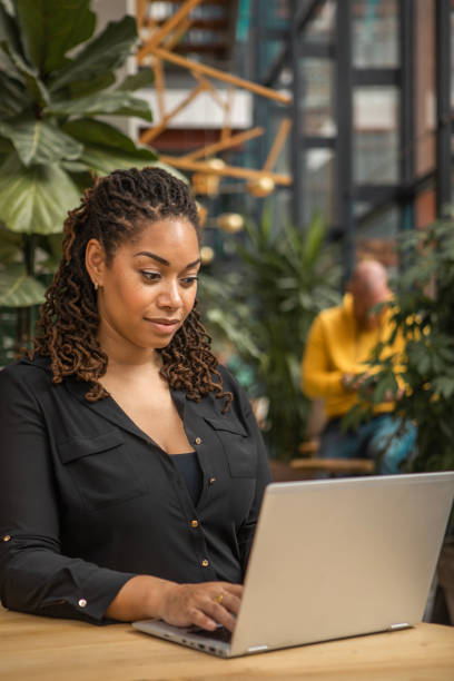 istock Beautiful diverse woman using an AI chatbot 1493148541