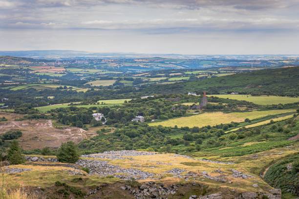 istock landscape with mountains, fields and a large church on the top 1493150576