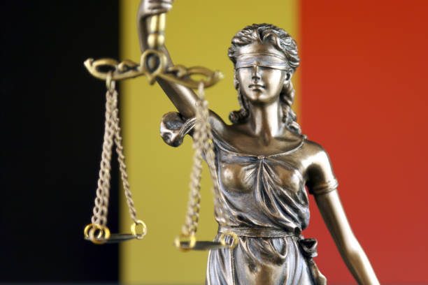 Symbol of law and justice with Belgium Flag. Close up. stock photo
