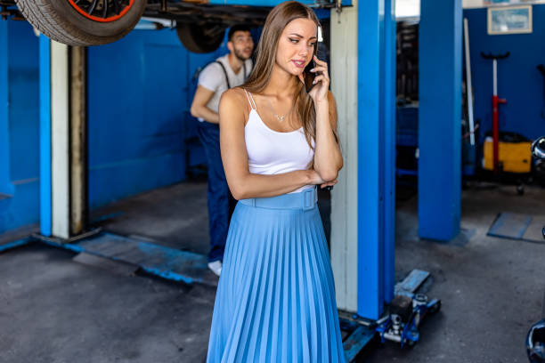 portrait of female mechanic in  auto repair shop