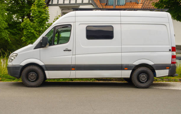 istock Older white van parked by the street 1493157668