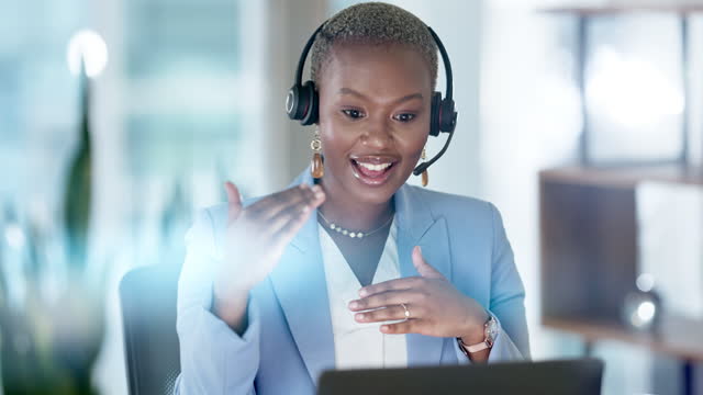 Video call, computer and black woman in virtual communication, call center or online meeting in night office. Professional person talking on laptop for support, career update or happy client advice