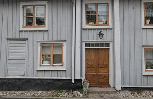 A old wooden building with door and windows