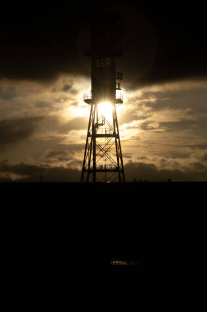 istock Old wooden water tower sunset 1493166941