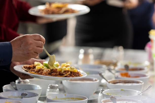 istock a man that is standing in front of a plate with food 1493166978