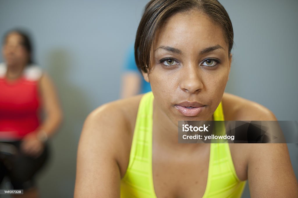 Woman exercising at gym  25-29 Years Stock Photo