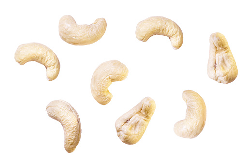 cashew nut isolated on white or Set of delicious cashew nuts, isolated on white background and Fresh tasty Cashew nuts falling in the air Food levitation concept. High resolution image