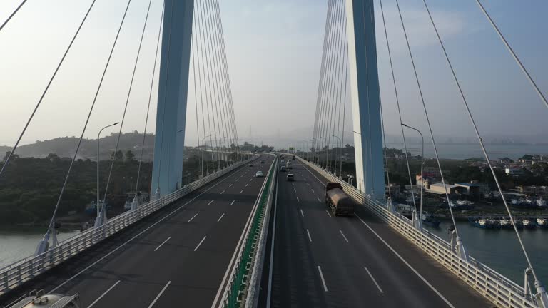 Low angle aerial photography of traffic flow on the cross sea bridge