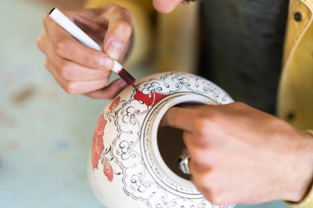 istock Artisan with tile painting art 1493181692