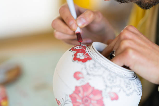 Artisan with tile painting art