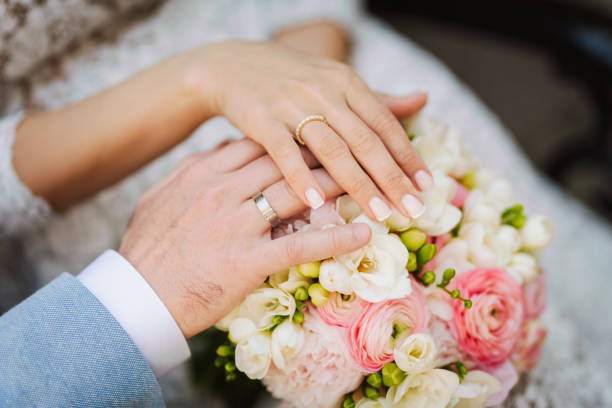 Just married couple - hands and wedding ringsFind more in my lightbox