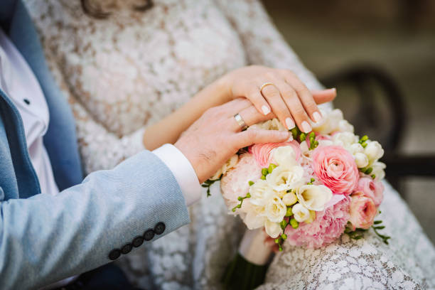 istock Bride and groom's hands close up photo. 1493182661