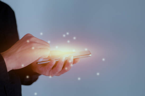 istock Close up of a businessman hand using smartphone 1493192644