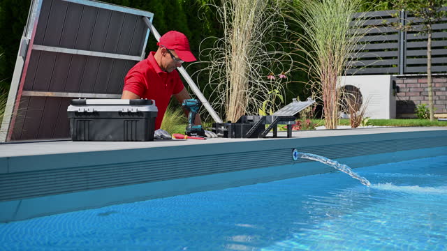 Residential Swimming Pool Technician Performing Regular Maintenance