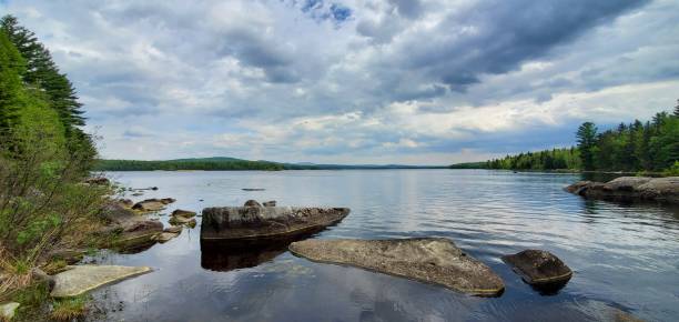 istock Cloudy sky and lake in Mont Saint Bruno National Park 1493194171