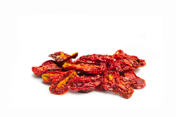 istock A heap of dried tomatoes on a white background with copy space 1493200734