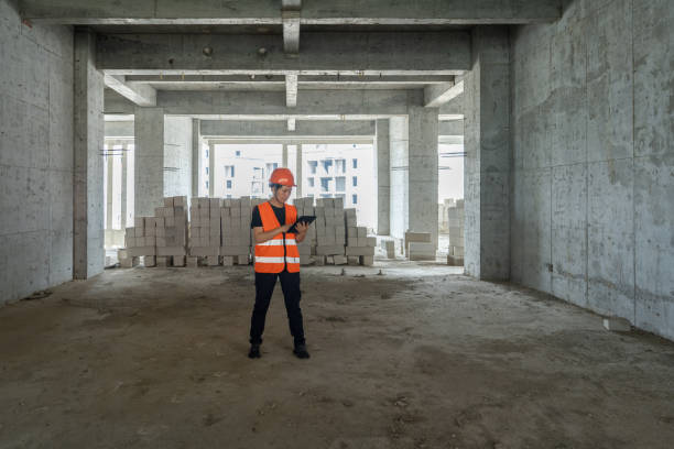 istock A female construction worker works in an unfinished building development 1493202960