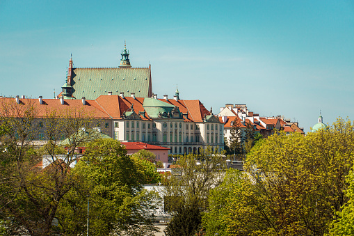 View of the eastern facade of the Royal Castle of Warsaw. The roof of the cathedral behind the castle