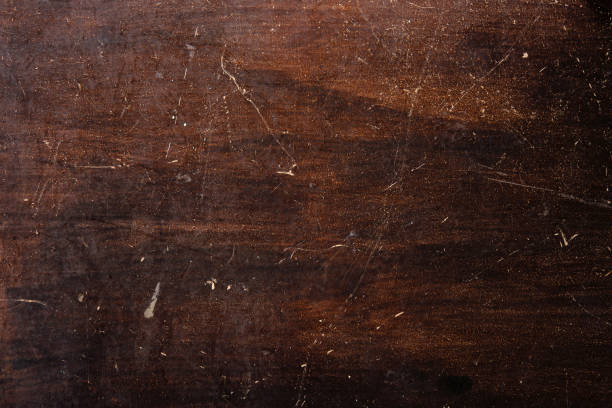 istock Old Dark Wooden Planks are Scratched, Background Textured 1493208307