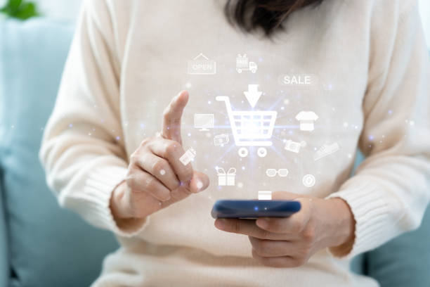 istock woman using smartphone for online shopping at home. stay home, technology, electronic commerce, internet, market place, final or summer or big sale, payment, discount for credit, offer, Low price 1493209973