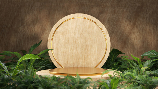 Wooden podium with gold in accents surrounded by green foliage. Display platform for a product presentation.