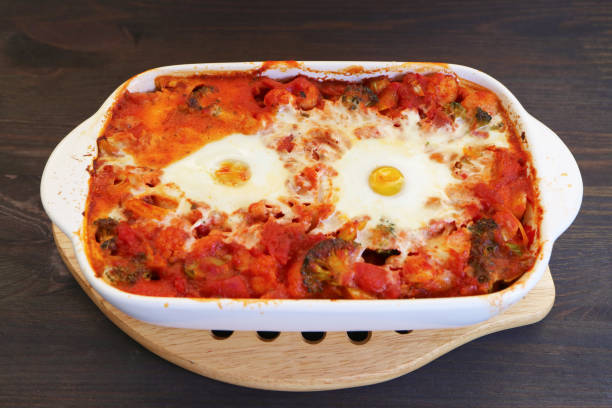 Delectable Shakshouka, a Dish of Poached Eggs in Flavorful Tomato Sauce