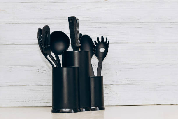 istock Kitchen tools plastic for multicooker on a wooden table in a dish organizer 1493221395