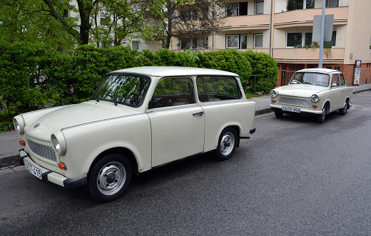 Budapest, Hungary - April 14, 2014: Two vintage Trabant cars on a street in Budapest, Hungary.