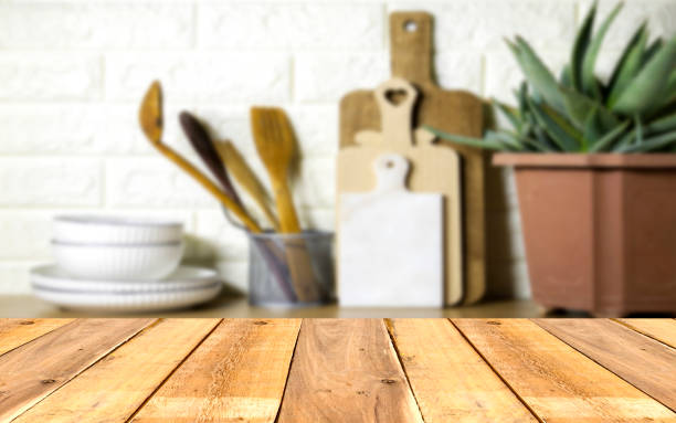 istock Empty wooden table with Kitchen utensils background , Mock up for display or montage of product,Banner or header for advertise on social media 1493239263