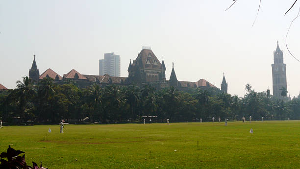 istock People playing cricket at the Oval Maiden, Mumbai, India 1493240109