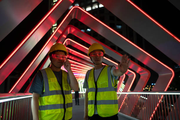 istock Worker man using glowing glasses for gaming experience and virtual reality concept 1493243895