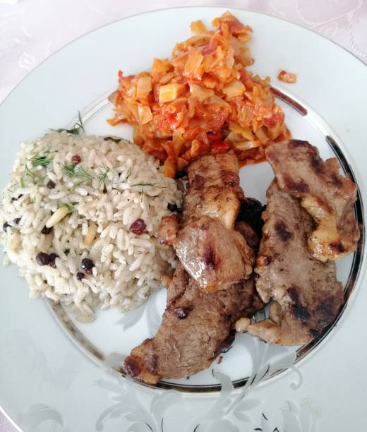istock Beef with pilaf and roasted Sauerkraut 1493253855