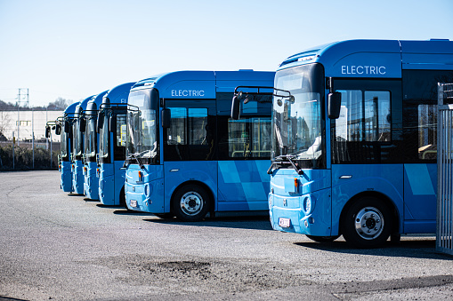 Gothenburg, Sweden - March 02 2023: Row of new blue electric city buses at a depot.