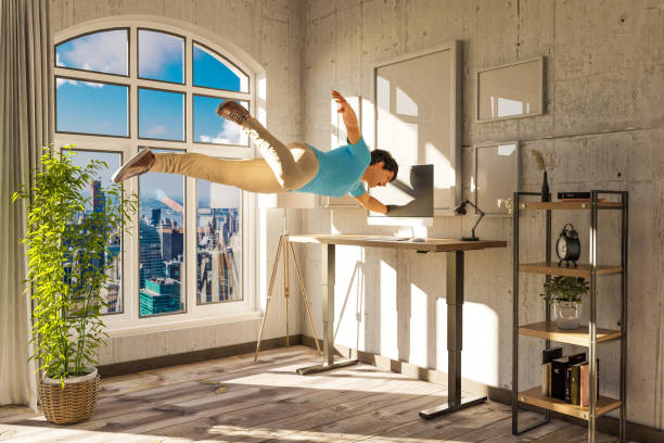 istock businessman floating in air gets sucked into pc display; surreal stress immersion and virtual reality concept; bright urban office with large window; 3D Illustration 1493258095