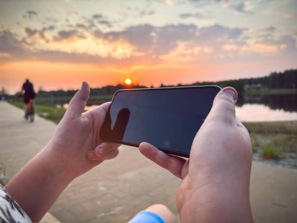 Hands holding phone