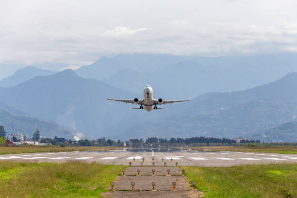 istock passenger plane takes off front view against 1493259248