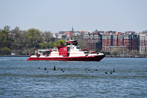 New York, USA, April 13, 2023 - The New York Fire Department's fireboat 